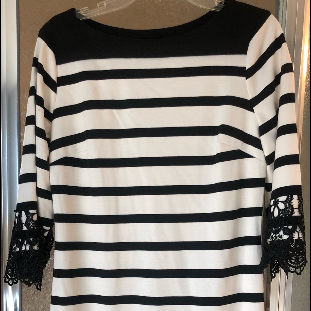 Black and white striped dress with lace trim